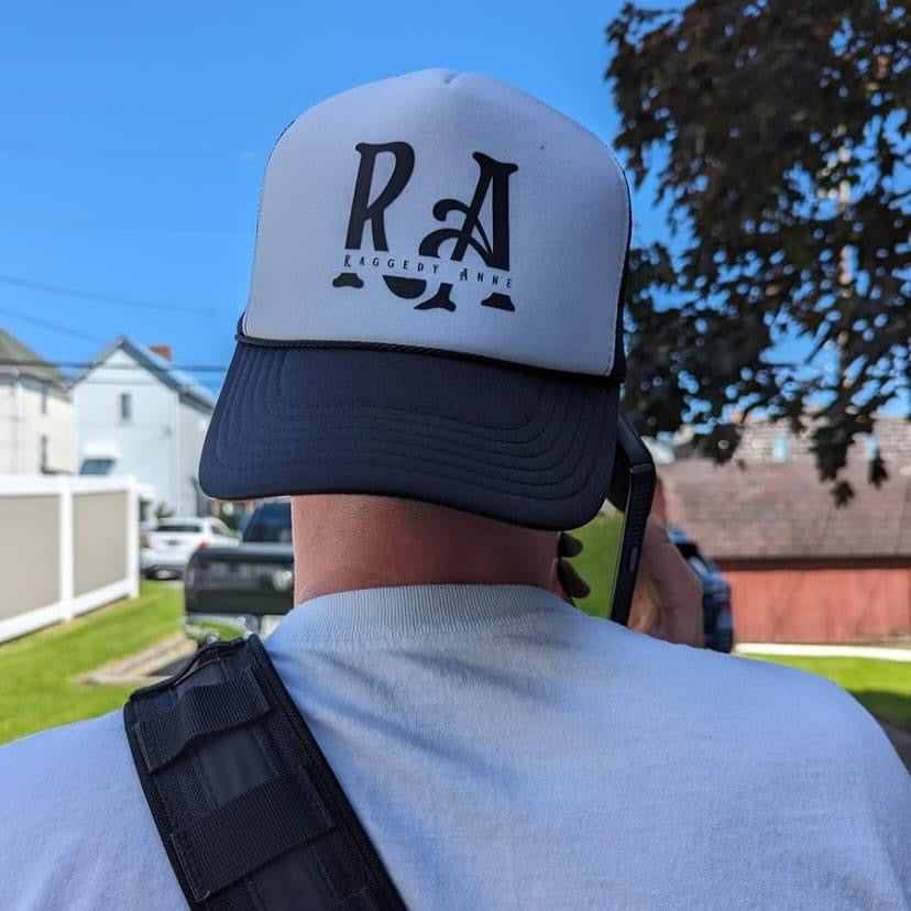 RA Black Logo Trucker Hat